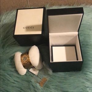 Gold band Gucci watch